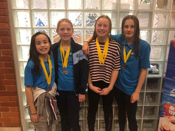 Charlotte Parvin, Kirsten Abrams, Constance Logan and Amelia Roberts - Mid Sussex Marlins record-breaking relay team
