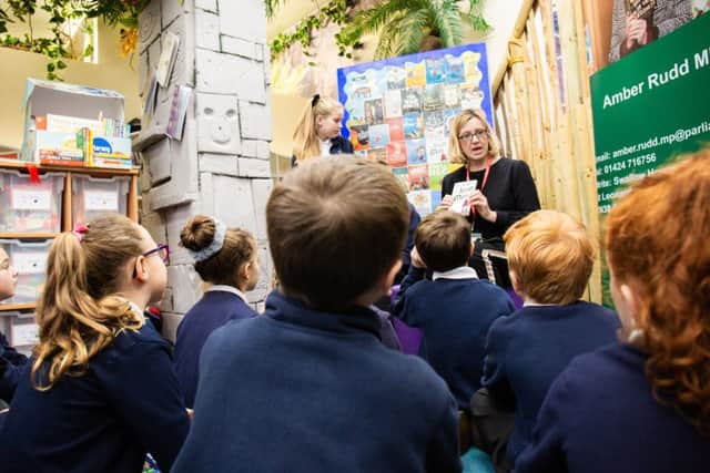 The launch of Get Hastings Reading. Amber Rudd MP reading to children at Silverdale Primary Academy. Photo by Caitlin Lock. SUS-190130-141725001