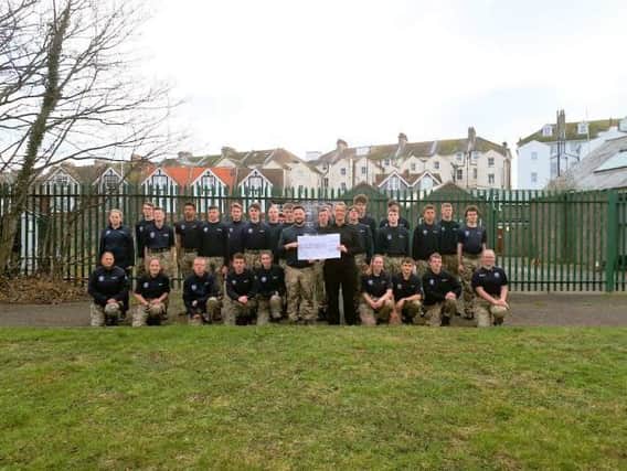 PC Rachel Bourne with students from the Military Preparation College SUS-190130-142931001