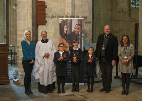 The reverends, charity manager and pupils from South Bersted C of E School