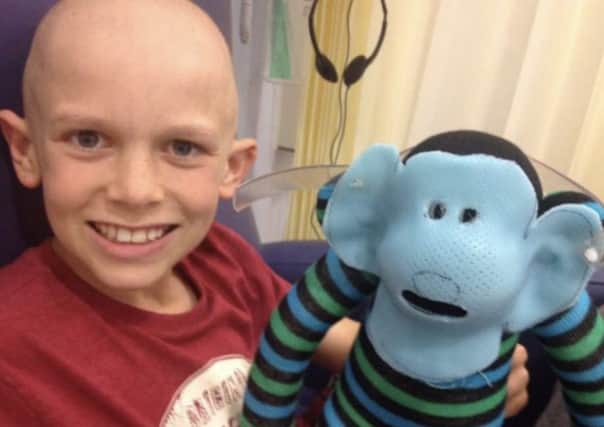 Jack's mum said he never complained once and maintained a 'huge smile' throughout his treatment SUS-190131-112441001