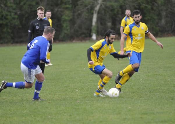 Bexhill Rovers on the ball during their cup victory over St Leonards Social II. Pictures by Simon Newstead