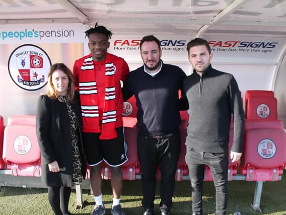 Crawley Town's new signing Matt Willock with his agent and Reds staff Kelly Derham and Selim Gaygusuz