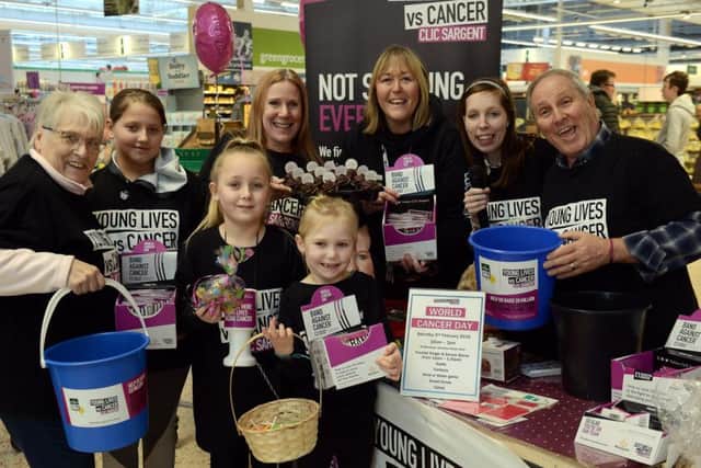 The team helping to raise money in Morrisons Littlehampton 
for World Cancer Day. Picture: Kate Shemilt ks190052-2