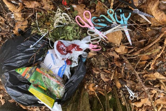 Scissors and pharmaceutical gloves were among the rubbish