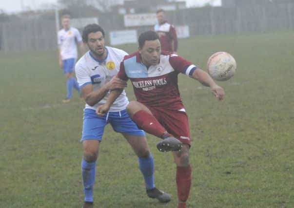 Little Common midfielder Wes Tate brings the ball under control during last weekend's 1-1 draw at home to Newhaven. Picture by Simon Newstead