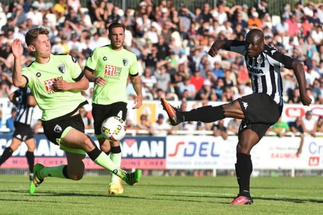 Corey Jordan (left) in action for Bournemouth