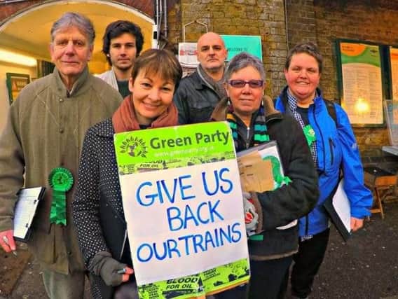 Green MP Caroline Lucas with Preston Park commuters