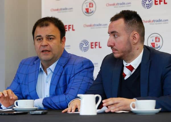 Crawley Town owner Ziya Eren, left, with director Selim Gayusuz at today's press conference at the Checkatrade Stadium.
Picture by James Boardman.