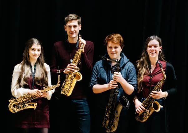 Jonathan Radford with saxophonists Sam Medwell, Alice Dukes and Isabelle Tucker