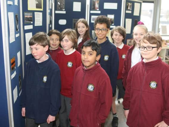 Year-six pupils from Swiss Gardens Primary School at their exhibition. Picture: Derek Martin DM1921050a