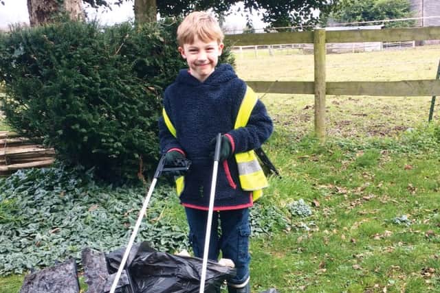 Monty and his parents filled three bin bags of litter on their first trip