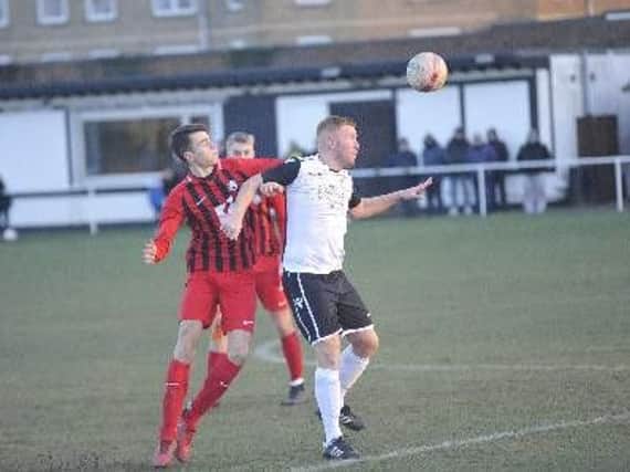 Action from Worthing United's league clash at Bexhill United. Picture: Simon Newstead
