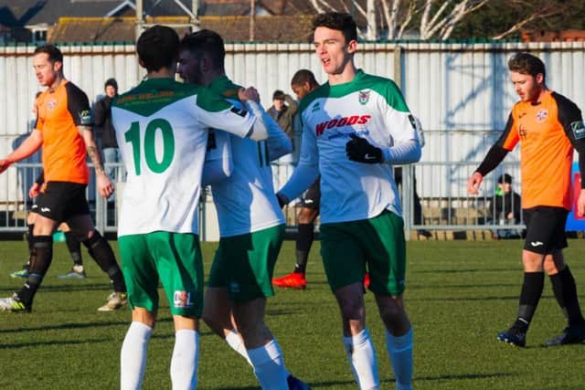 Bognor players celebrate after Brad Lethbridge's equaliser / Picture by Tommy McMillan