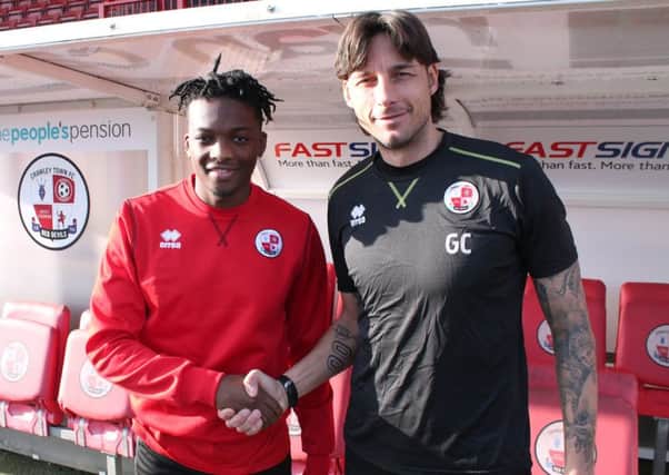 Crawley Town head coach Gabriele Cioffi welcomes new signing Matty Willock.
Picture courtesy of Crawley Town SUS-190402-194018002