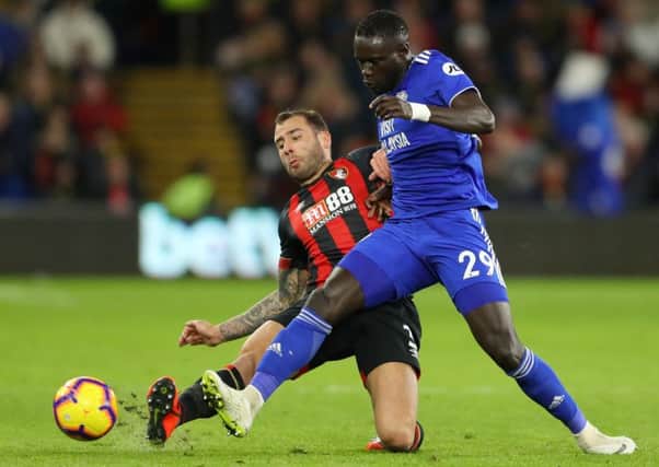 Steve Cook slides in to a tackle during his 300th appearance for AFC Bournemouth against Cardiff City. Picture by Warren Little/Getty Images
