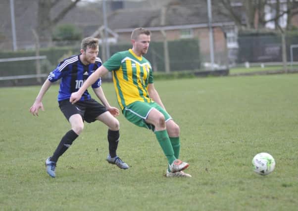 Action from the cup clash between Hollington United and AFC Uckfield Town II a fortnight ago