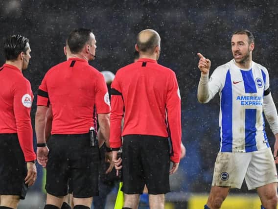 Glenn Murray confronts the officials at the final whistle. Picture by PW Sporting Photography
