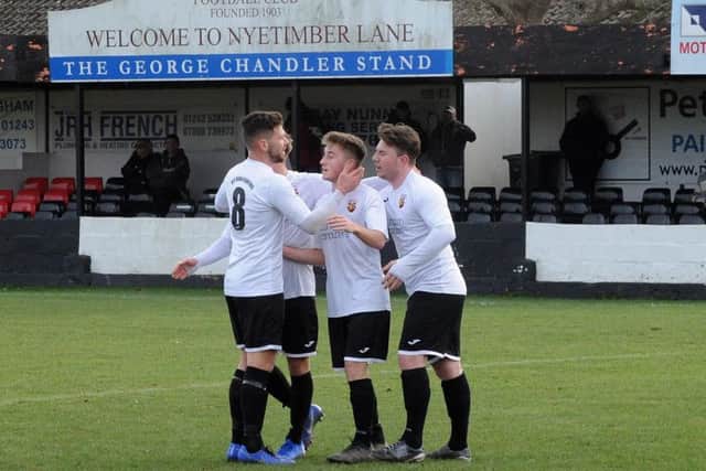 Pagham celebrate Harry Prisk's goal / Picture by Kate Shemilt