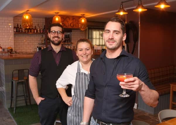 Staff members Will Underwood, Marrianne McDonald and Michal Peterka at the opening of the bar in September