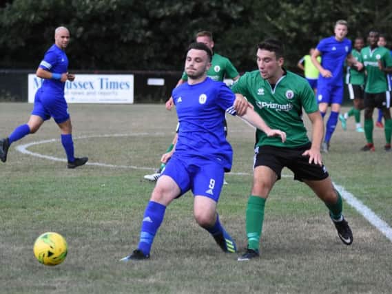 Action from July's pre-season friendly between Burgess Hill Town and Haywards Heath Town at the Green Elephants Stadium. Picture by Grahame Lehkyj.