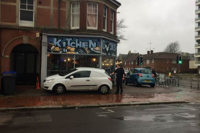 Jason Earl with his car parked on the land outside his restaurant in Brighton Road, Worthing