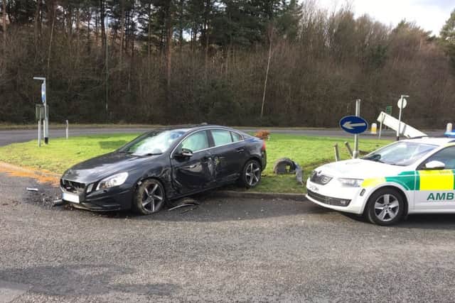 A car collided with signs at a Haywards Heath roundabout
. Picture supplied by Allan Large