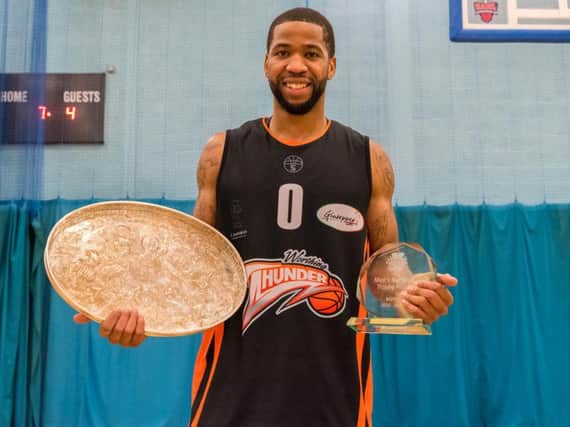 Jorge Ebanks with the National Trophy and MVP award. Picture: Kyle Hemsley