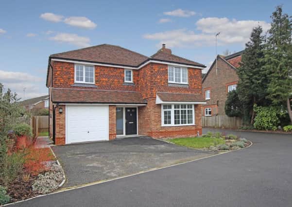 This four bedroom detached family home in Horsham is on the market for £725,000 from Woodlands Estates