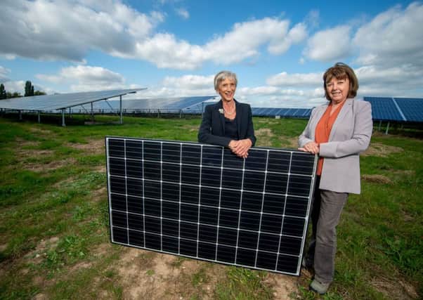 Louise Goldsmith and Deborah Urquhart at the new solar farm in Westhampnett. Photo by Darren Cool www.dcoolimages.com SUS-180910-174834001