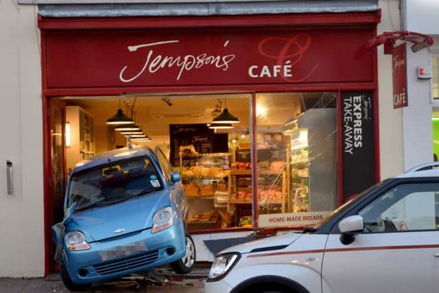 Car crashes through Jempson's Cafe, in Western Road, Bexhill