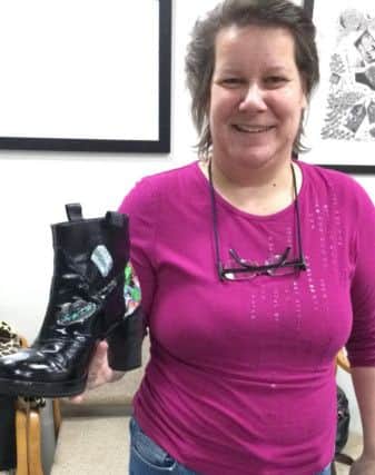 Learning thrifty shoe upcycling skills at Sheryl Hall's free Art Workshop held to raise awarness of Narcolepsy. SUS-191202-151257001