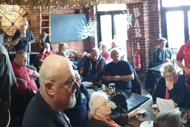 Veterans enjoying a celebratory breakfast at Cafe 72 in Littlehampton