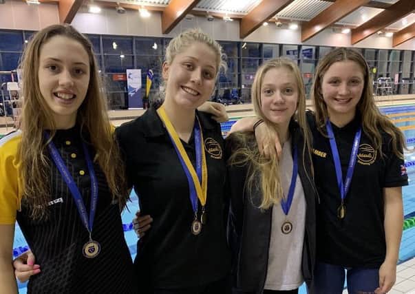 Atlantis Swimming Club's county champions Issy Hayes, Lilly Davis, Anna Sayers and Amber Ranson