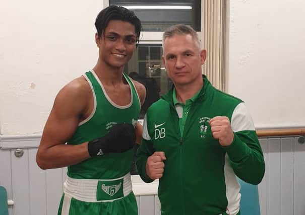 Ruhan Ahmed with West Hill Boxing Club coach Dave Bishop
