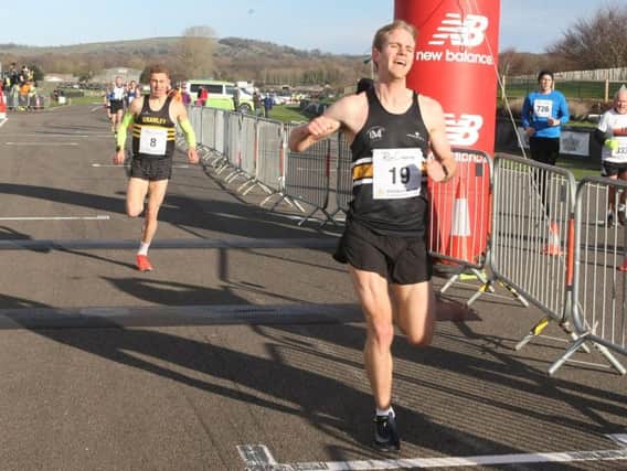 Paul Navesey - seen here finishing a second behind winner Will Mycroft - was the top Sussex runner in the Chi Priory 10k / Picture by Derek Martin