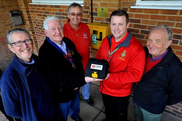 Defibrillator unveiling at Keymer and Hassocks Sports Social Club.
Bill Hatton (Hassocks parish councillor), John Gee (President Burgess Hill district Lions),  David Price (Chairman of Keymer and Hassocks Sports Social Club),  Russell Spencer (Community First Responder), Derek Jenner (President of Keymer and Hassocks Sports Social Club). Pic Steve Robards SR1903846 SUS-190213-165941001