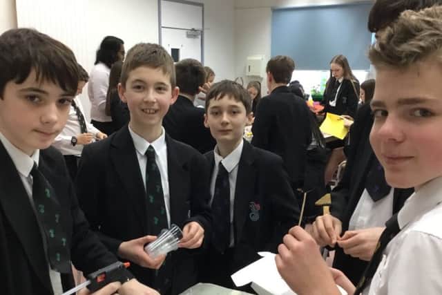 Students from Upper Beeding working together to create their wind turbine