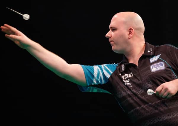 Rob Cross at the oche during his 7-4 win against James Wade in Glasgow. Picture courtesy Steve Welsh/PDC