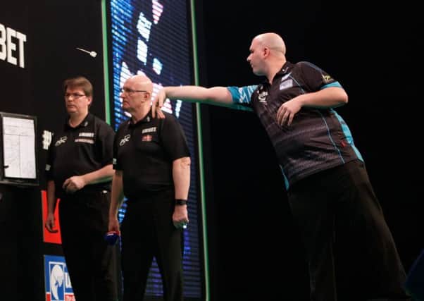 Rob Cross in action during his victory over James Wade. Picture courtesy Steve Welsh/PDC