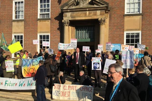 Protesters today outside county hall