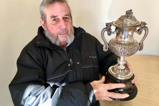 Colin Treagus, 78, with the mystery sports cup