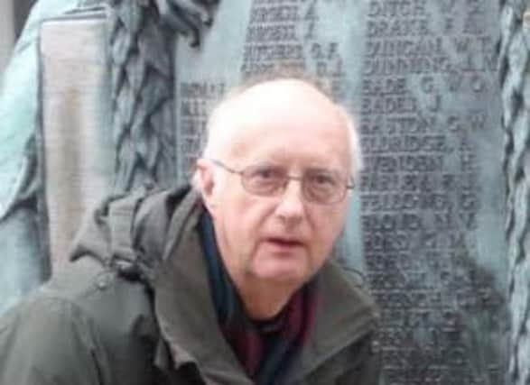 Painstaking research: Dr Graham Mayhew at Lewes War Memorial