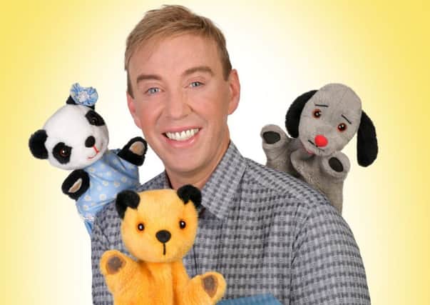 Richard Cadell with Sooty, Sweep and Soo. Picture by Steve Ullathorne