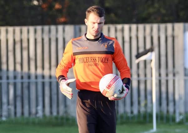 Little Common goalkeeper Matt Cruttwell kept a clean sheet in yesterday's draw at home to Arundel. Picture courtesy Joe Knight
