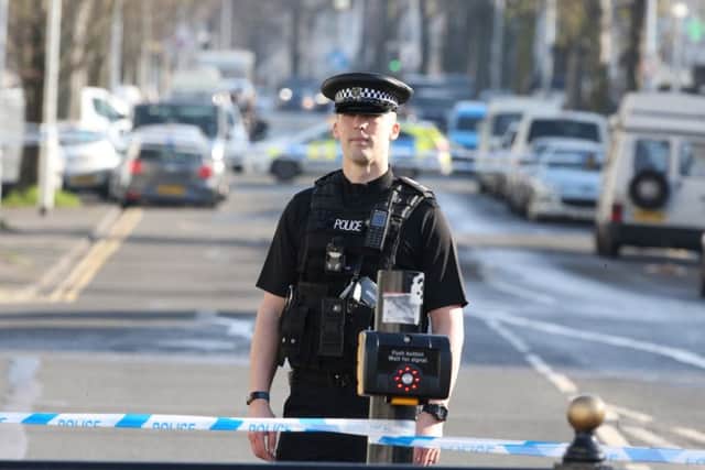 Police have closed off Elm Grove in Brighton following the serious assault