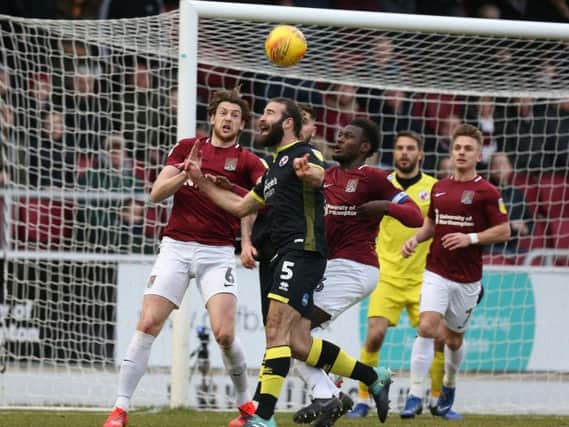 Joe McNerney attempts to head the ball under pressure during the Sky Bet League Two match between Northampton Town and Crawley Town. (Photo by Pete Norton/Getty Images)