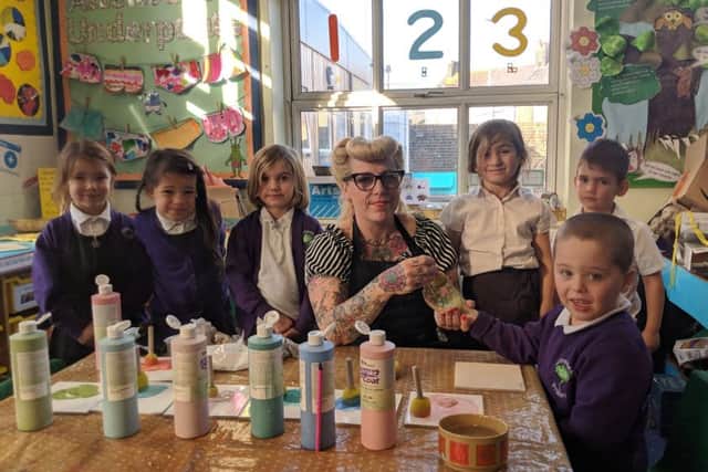 All the children at Whytemead Primary School in Worthing are creating a mosaic after winning a draw by Artful Pottery