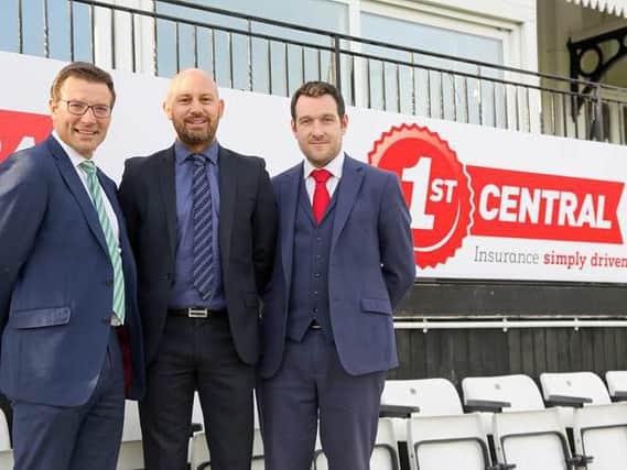 Tom Acott (centre) joins Rob Andrew (left) and Chris Coleman (right) at The 1st Central County Ground / Picture: Sussex Cricket