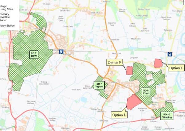 Shortlisted options for a new secondary school in Arun (from Systra report) strategic housing allocations are hatched in green, with potential school sites in red